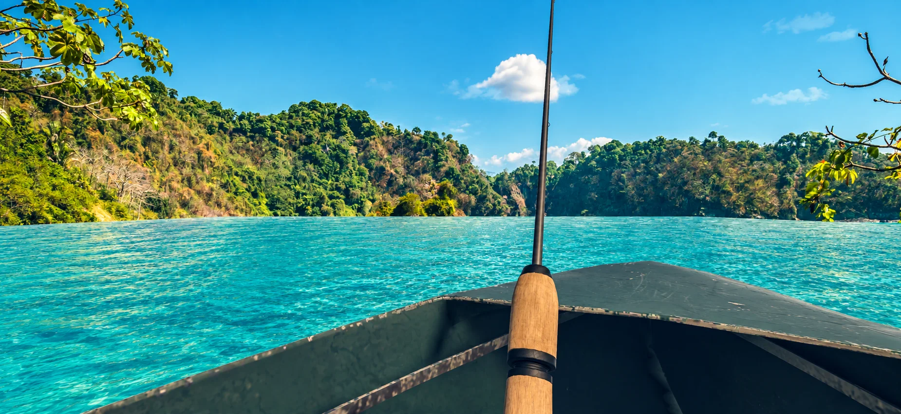 Fishing from a boat in the turquoise tropical waters of Costa Rica