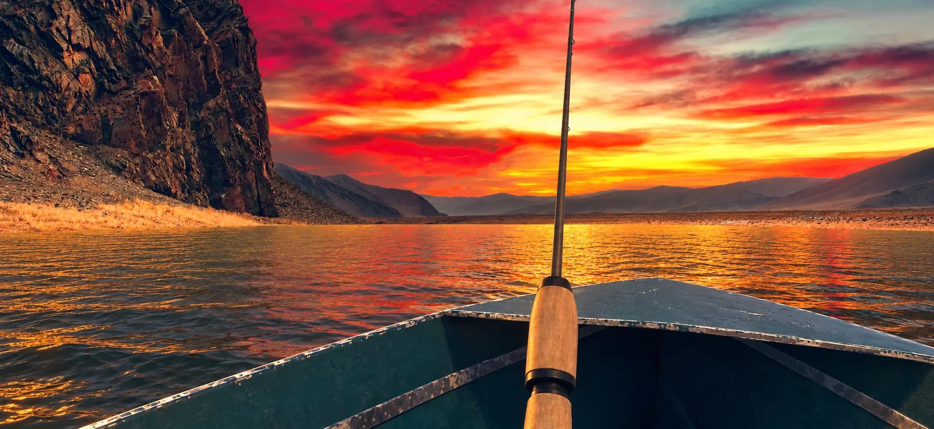 Fishing at sunset among the cliffs and open steppe of the Mongolian Highlands